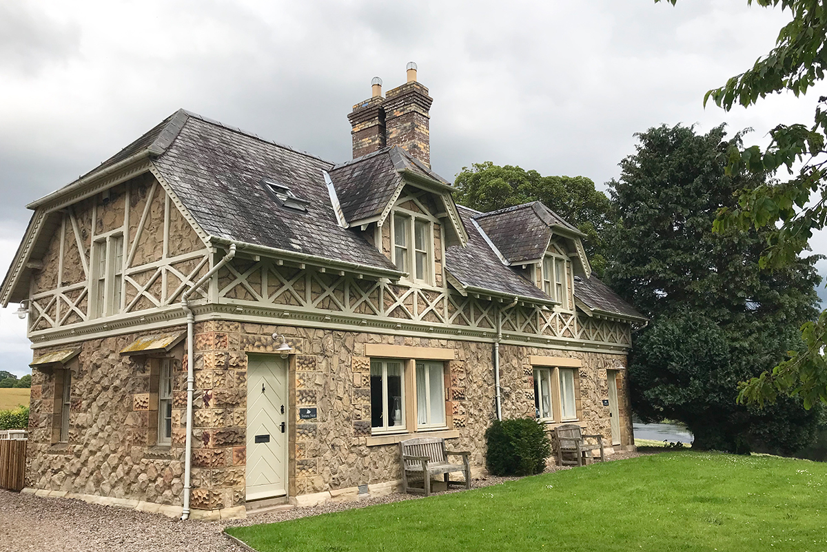 Milne-Graden-Swan's-Nest-Cottage-Exterior-with -view-to-river-tweed