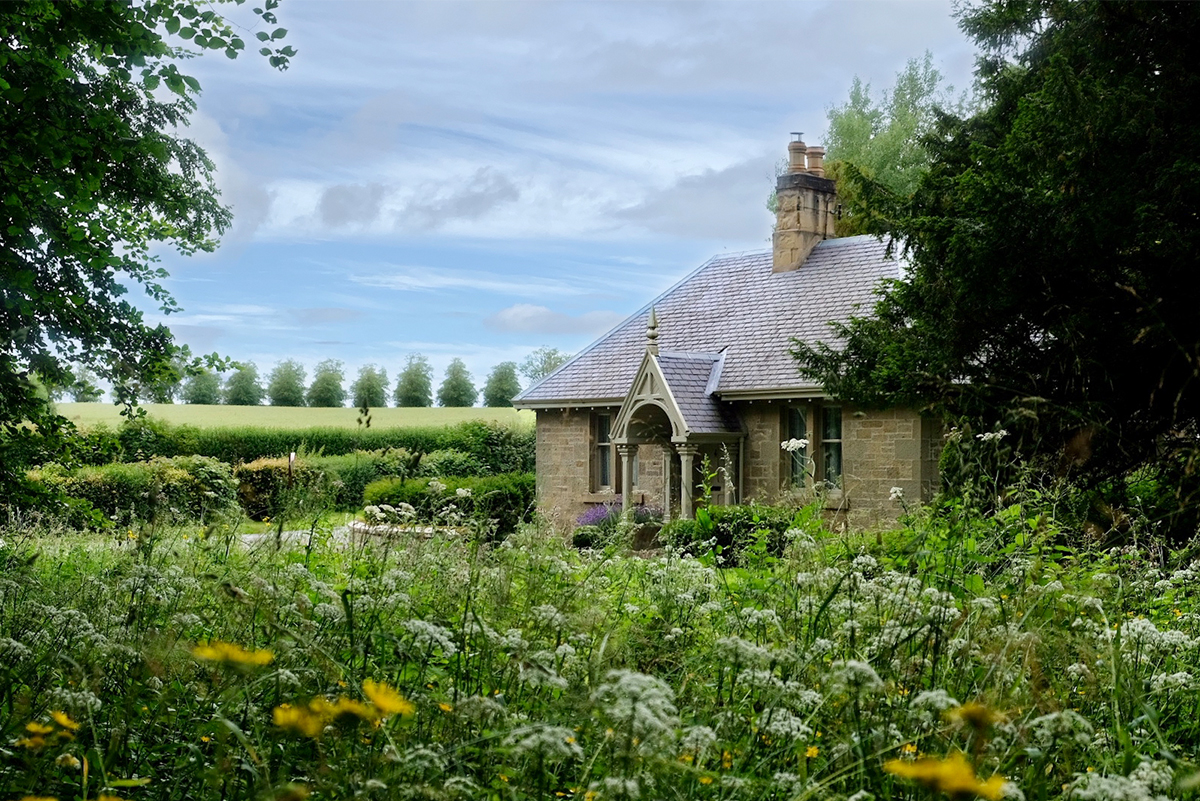 https://talesofthetweed.co.uk/wp-content/uploads/2020/07/Milne-Graden-Summer-looking-at-Park-End-holiday-cottage-through-Wild-Flowers.jpg