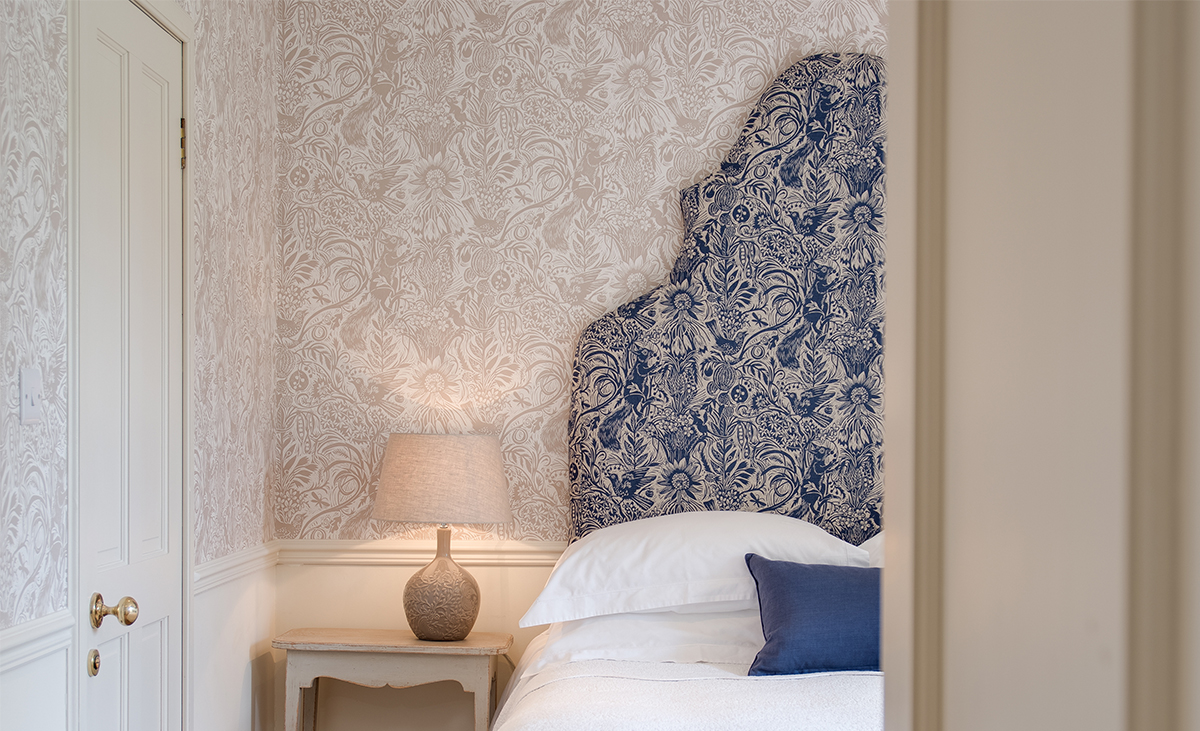 Milne-Graden-Holiday-Cottages-Hamilton-House-Squirrels-and-Sunflowers-fabric-on headboard-and-walls